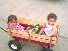 In the wagon with friend Sophia