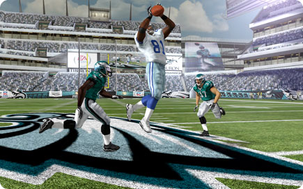 Player jumping to catch the football.