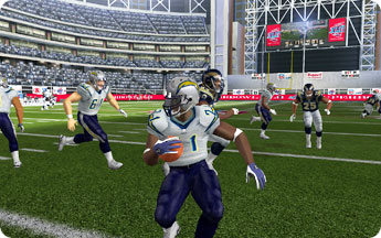 Player glances to the side with football in hand.
