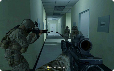 Team taking positions in a hallway.
