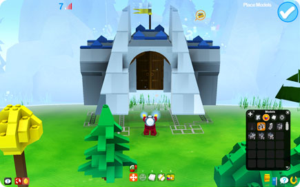Lego man placing a castle gate.